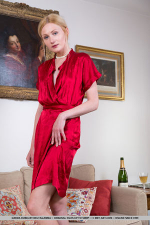 Slender blonde Gerda Rubia teases with her shaved pussy under her dress